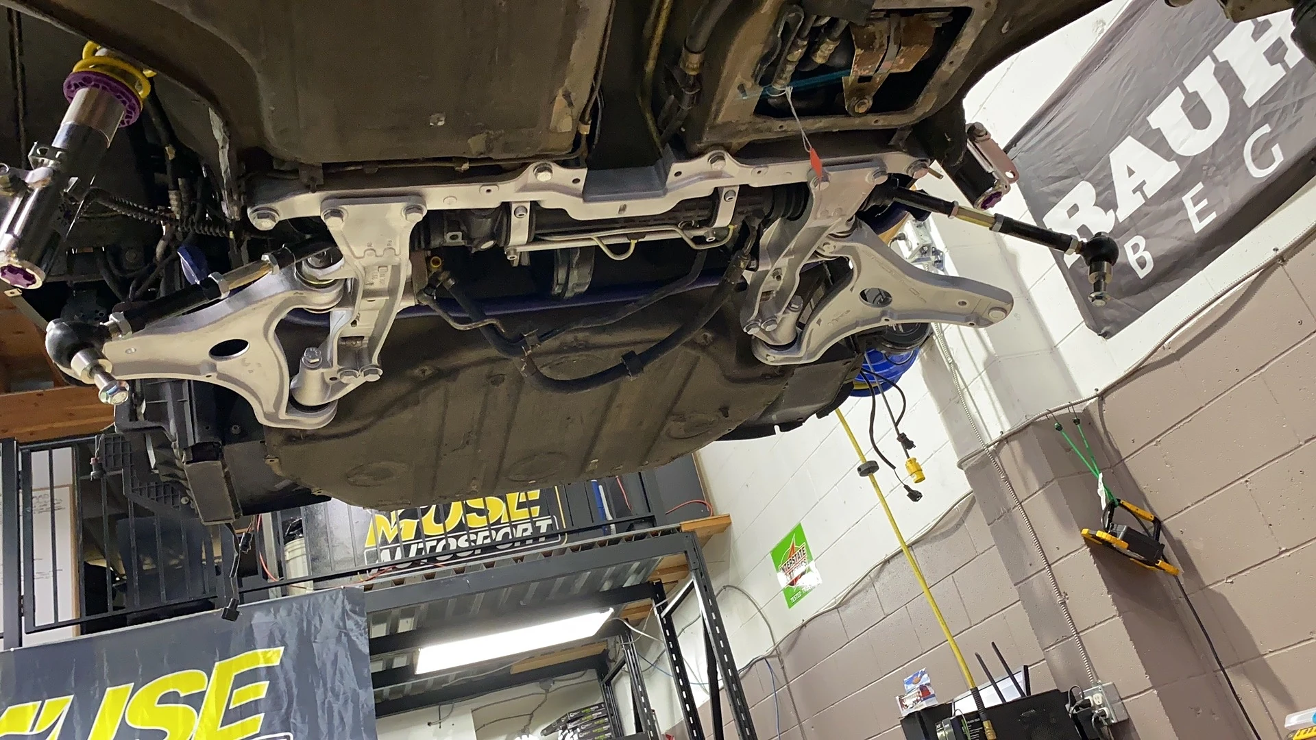 Car on the lift in the Granville Auto Repair workshop
